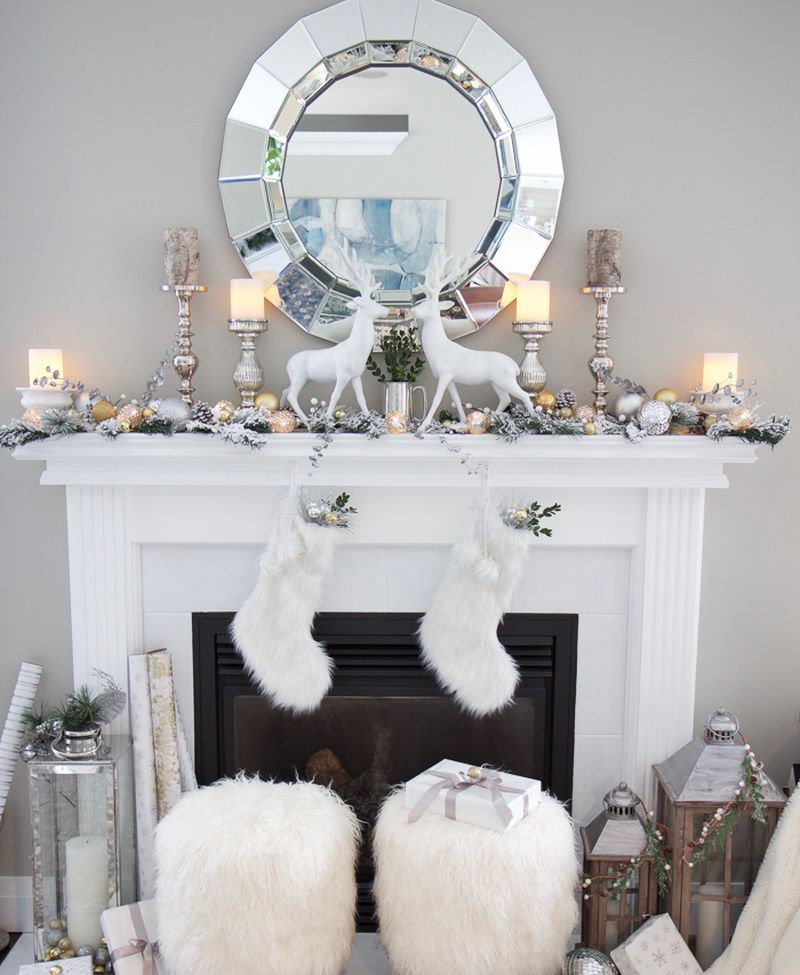 flocked pine boughs, gold and silver Christmas balls on fireplace mantel 