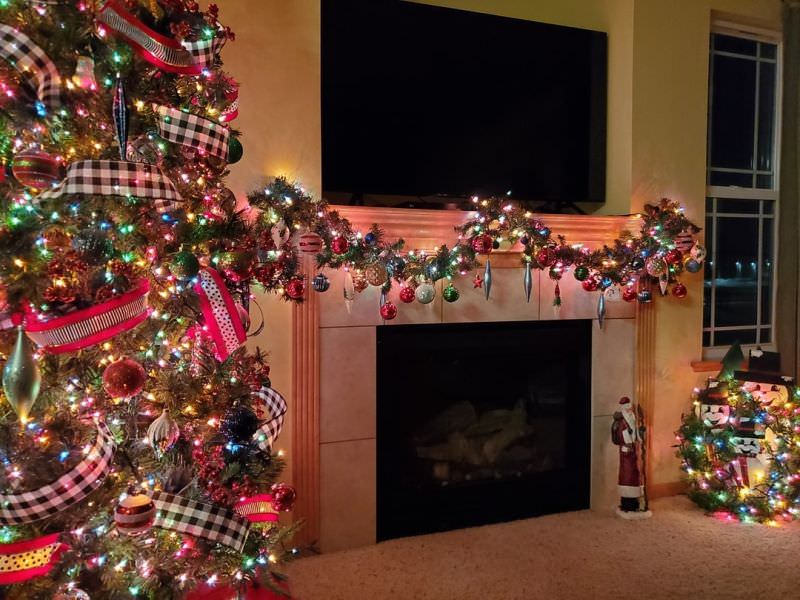 Christmas Fireplace Mantel Decoration with ornaments and lights 