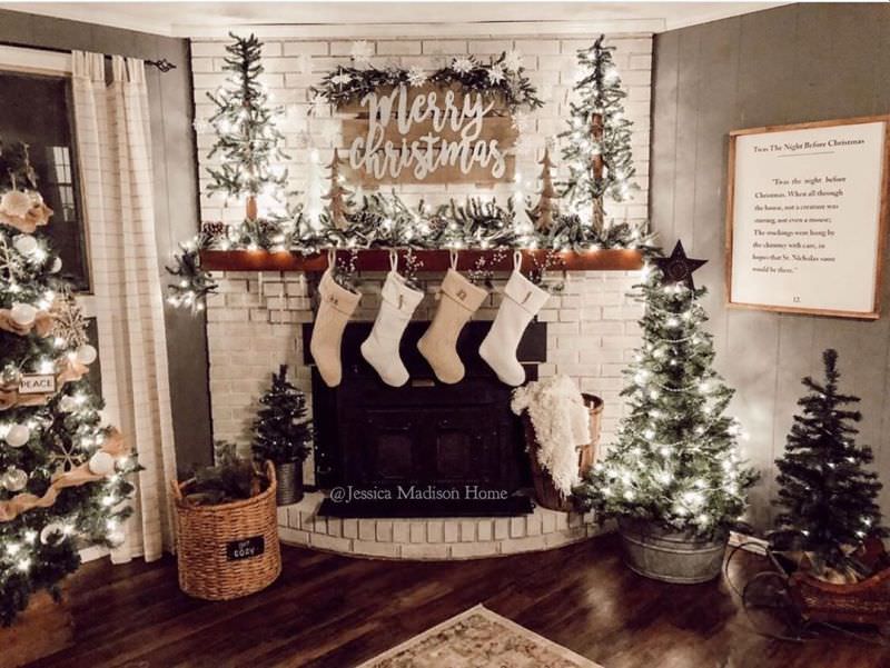 merry Christmas sign over fireplace mantel 