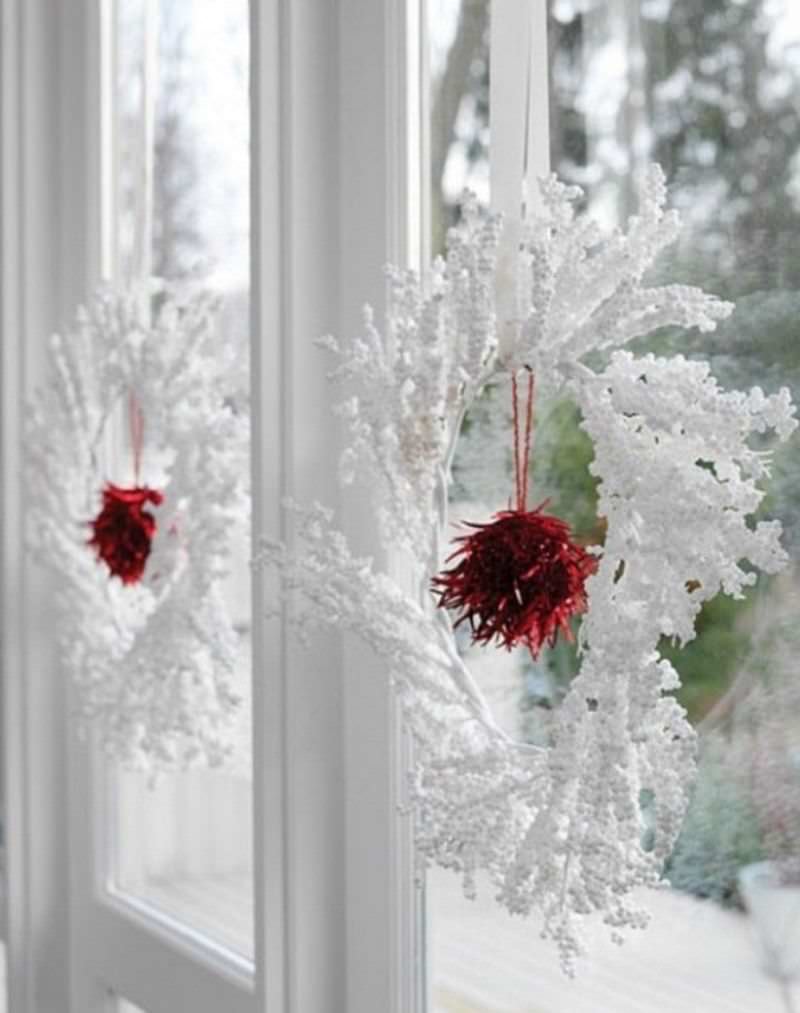 white wreaths on window 
