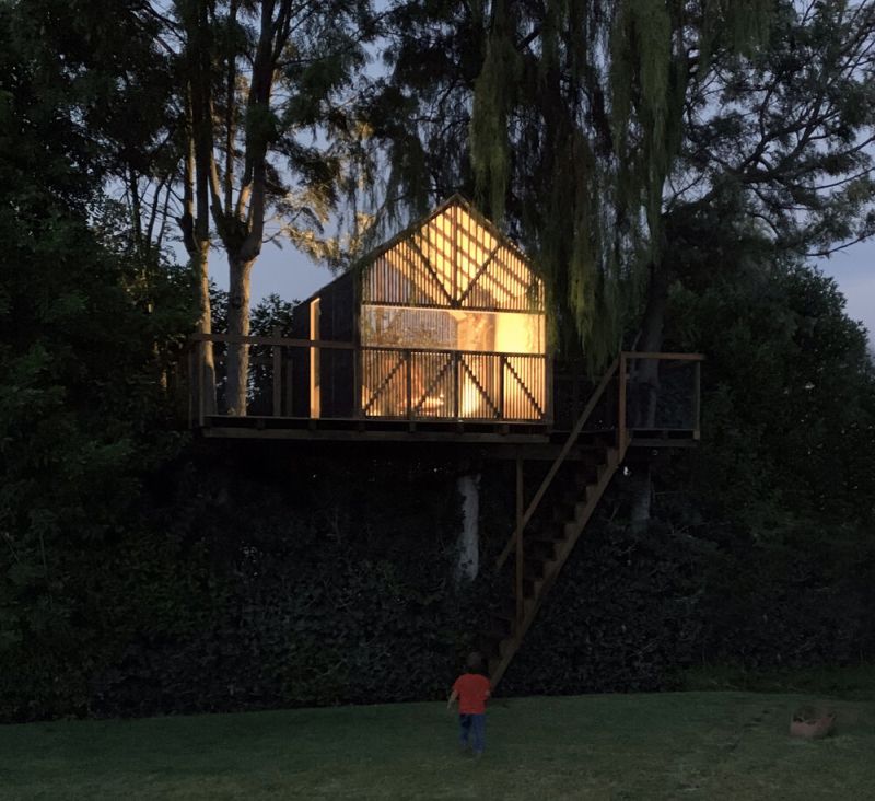 This Backyard Treehouse for Kids has Charred Wood Exteriors 