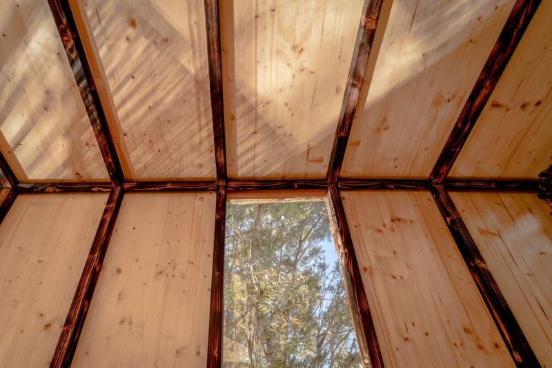 This Backyard Treehouse for Kids has Charred Wood Exteriors 