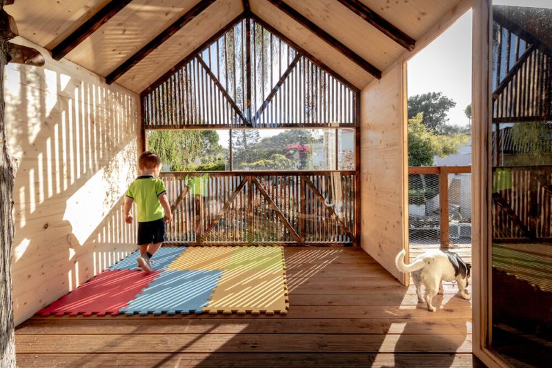 This Backyard Treehouse for Kids has Charred Wood Exteriors 