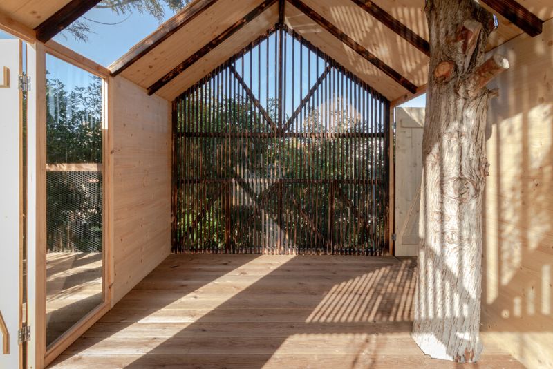 This Backyard Treehouse for Kids has Charred Wood Exteriors 