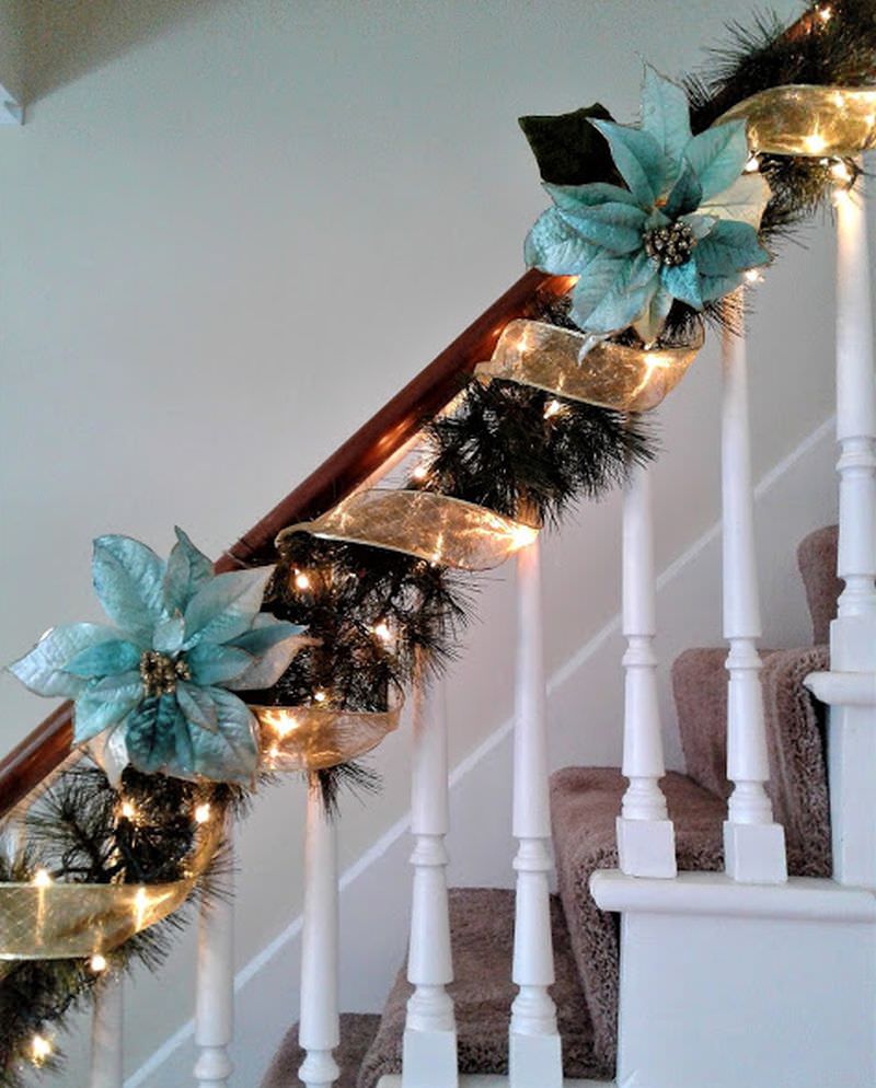 Faux blue flowers and garland for decorating staircase  