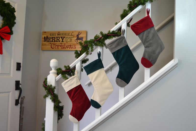 Stockings and garland on staircase 