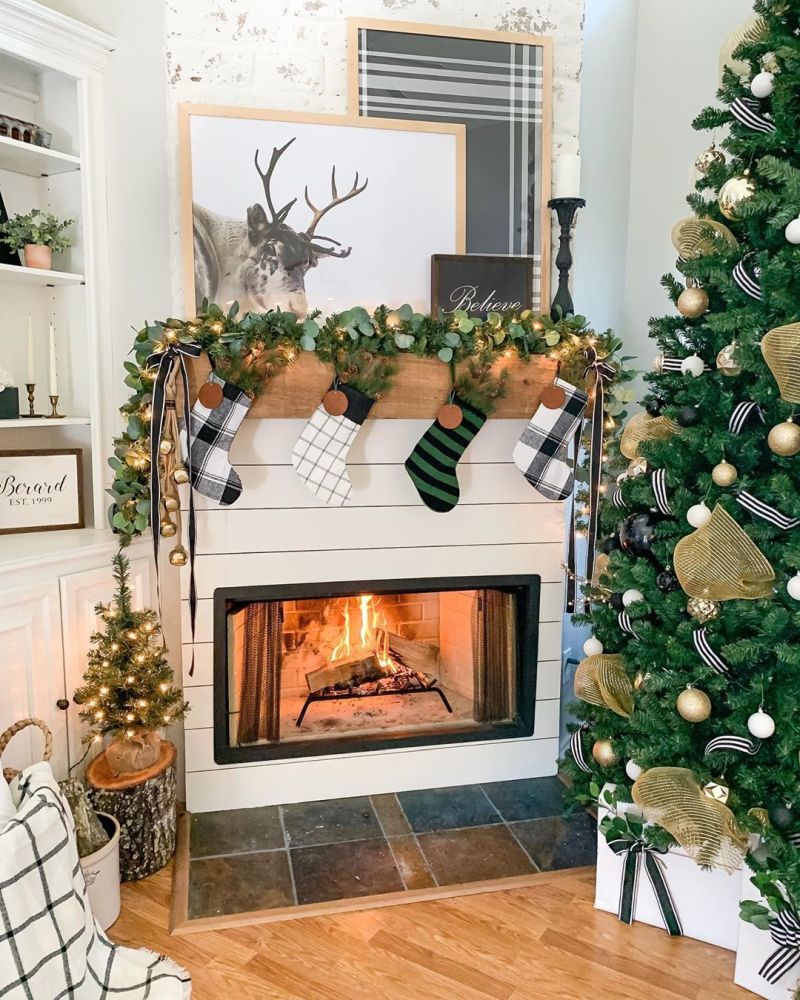 green leaves garland on fireplace mantel 