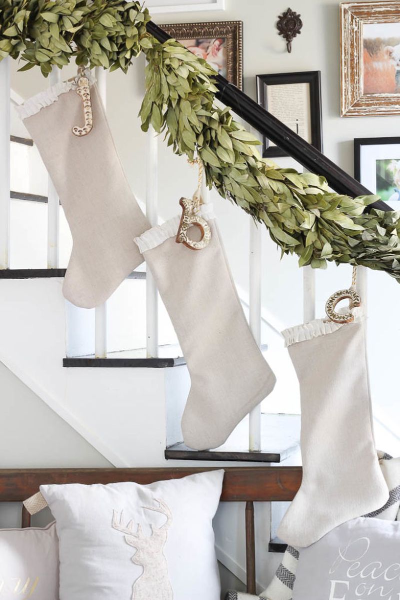 Christmas staircase decoration with magnolia garland