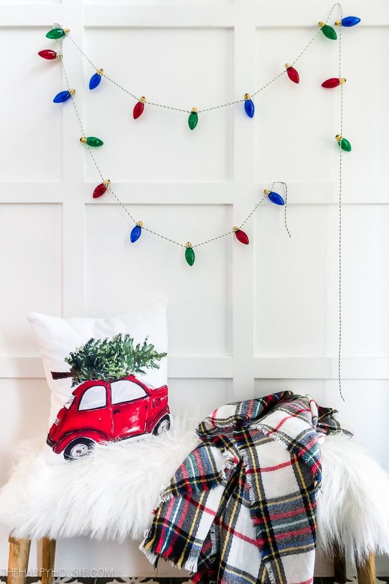 Christmas garland lights on wall 