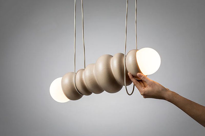 Studio Sein, Hermann Viehauser Creates Posable Wooden Table Lamp 