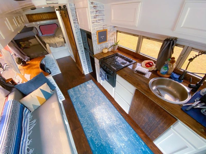 Couple Travels Full-Time in Converted Bus Home with Baby Girl and Dog