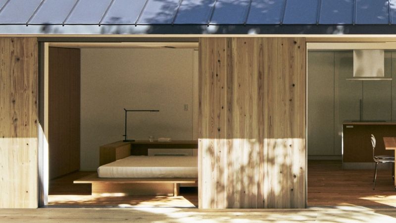 Muji’s Latest Prefab House Features Large Outdoor Deck with Sunken Seating & Fireplace
