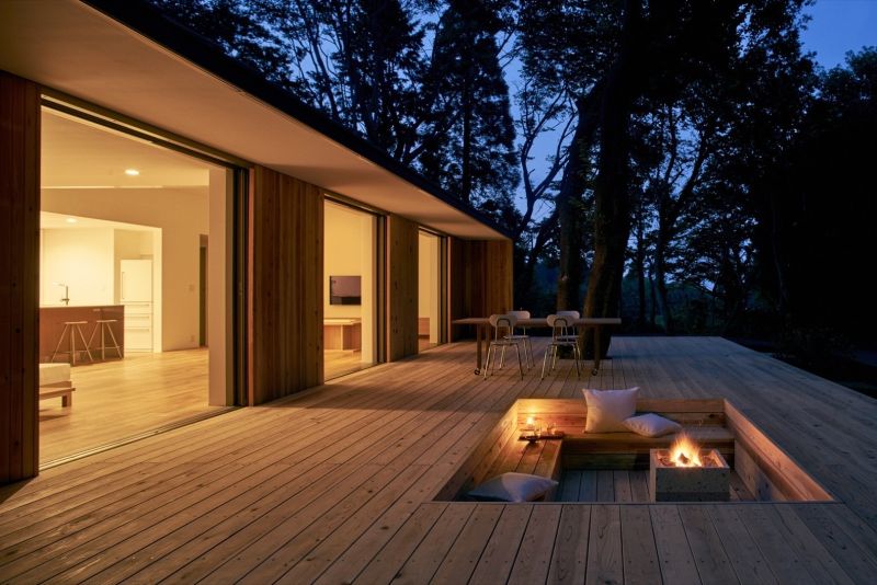 Muji’s Latest Prefab House Features Large Outdoor Deck with Sunken Seating & Fireplace