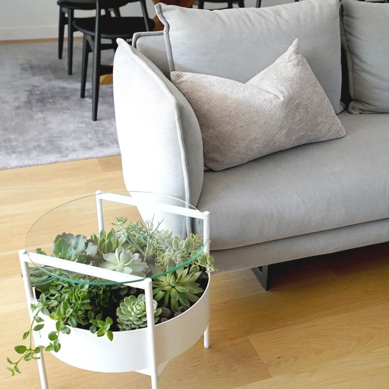 Palm Urban’s Green Glass Table has Built-in Planter 