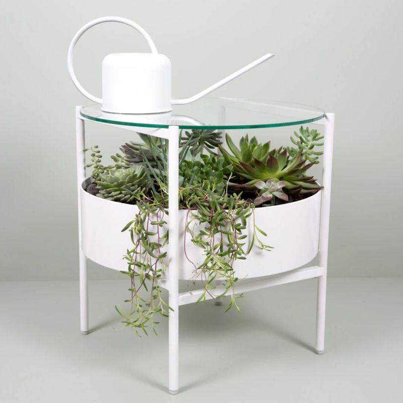 Palm Urban’s Green Glass Table has Built-in Planter 